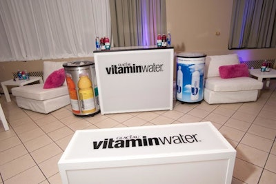 White lounge furniture and product samples filled the area sponsored by Vitaminwater.