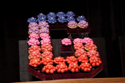 Sugar Bliss Cake Boutique arranged colorful treats in a pattern that spelled out the event's name.