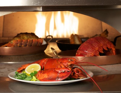 Lakeside's Lobsterphoria offering allows guests to try wood and stone oven-roasted lobsters from around the world, including West Australia, South Australia, South Africa, and when available, France, Portugal, Morocco, and the Caribbean, prepared a number of ways: stuffed with lobster and crabmeat, rubbed with red chili roasted in garlic and spices, or grilled with citrus-herb butter. The lobsters can be made to order as entrées, appetizers, or platters, and are offered for private events anywhere on the Wynn property.