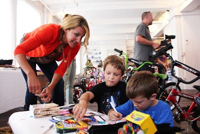 Schwinn brand ambassador Summer Sanders (pictured, far left) encouraged kids to make their own decorations for their bikes, including paper license plates.