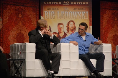 The reunion wasn't just about the cast, as music producer T-Bone Burnett (pictured, left) joined Bridges, Turturro, Steve Buscemi, Julianne Moore, and John Goodman on stage at the event.