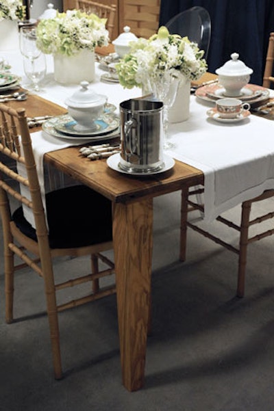 Hall's Rental showcased its new Sèvres china pattern with dainty, pastel dishes set atop farm-style tables.