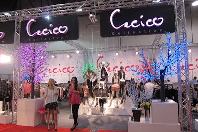 Cecico's booth glowed with the light from multicolor tree decor pieces.