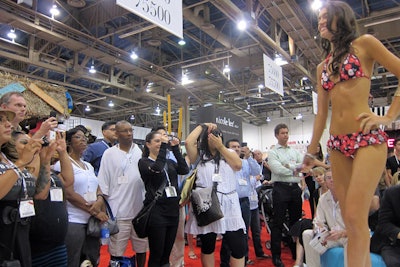 Models strutted for a crowd in the Las Vegas Convention Center, showing off swim looks twice daily.