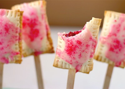Elegant Affairs Caterers offers passed mini Pop Tart lollipops in apple cinnamon, strawberry, and s'mores flavors.