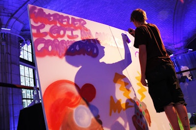 To illustrate the how its customers feel about their cell phones, AT&T brought in artist Matt Siren to create an art piece live at the event.