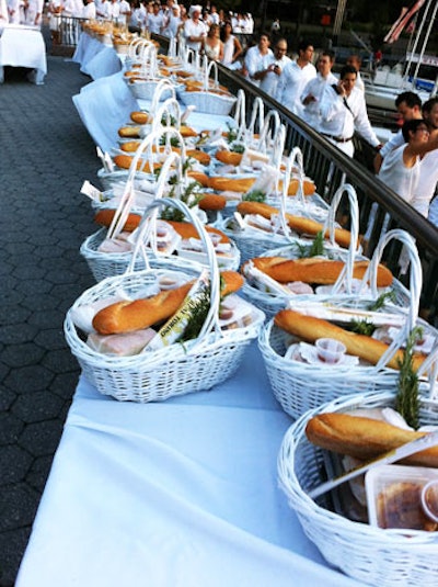 There were already lines of people waiting for food and wine by the time our group got to the location, and only a handful of people to distribute the goods. Guests waited as long as 45 minutes to collect the wine and food baskets only to be told that the wine they ordered was still on its way.