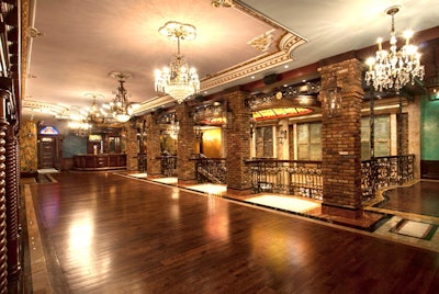 Dark wood flooring with marble detailing can be found on the royal mezzanine.