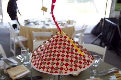 Centerpieces were hats designed by local teens.