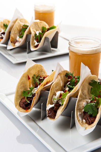 Thai-style local skirt steak tacos with cilantro, onion, sour cream, and sriracha paired with Phoebe’s Fall Pilsner brewed by Eat & Smile in Washington