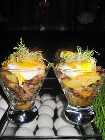Mena Catering in Miami created a hash bar with soft poached eggs served in a martini glass with an assortment of freshly made ingredients and hollandaise sauces.