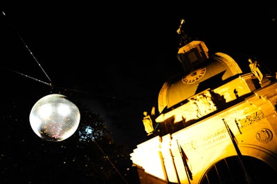 The four-foot mirror ball was suspended over the courtyard with steel cables attached to the building.