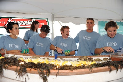 Island Creek Oysters Foundation staffed its raw bar with servers in branded t-shirts.
