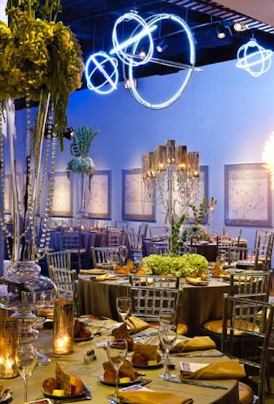 At the dinner tables, Event Creative designer Jeffrey Foster used candlesticks and candelabra draped in crystals.