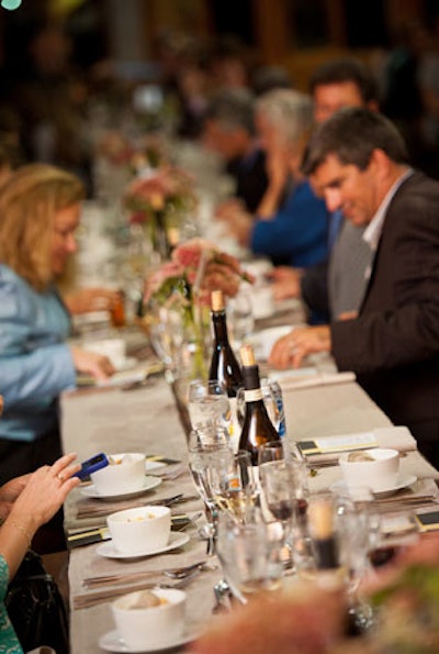 Tabletop flowers were sourced from Serving Ourselves Farm. The arrangements were housed in homey mason jars.