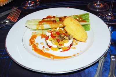 Windows' servers plated the first course of grilled vegetable and goat cheese timbales with romaine salad, pine nuts, and a sun-driedtomato vinaigrette before the dinner area opened.