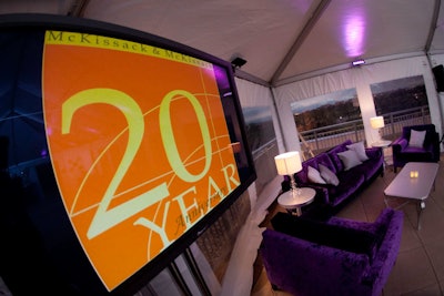 Wells outfitted the after-party lounge with purple sofas and chairs accented by silver pillows, tables, and purple uplighting around the perimeter of the rooftop space.