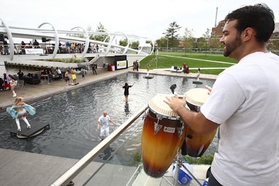 Two drummers played bongos along with the DJs on the main stage from a patio across the pool.