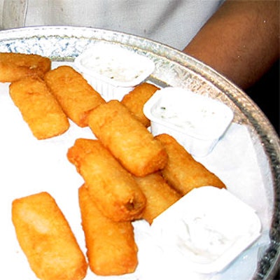Fish Tenders were served as hors d'oeuvres on silver trays with dipping sauce.
