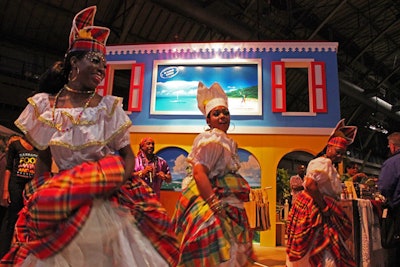 Elaborately costumed dancers surrounded the display for St. Crois, U.S. Virgin Islands, creating a carnival-like atmosphere.