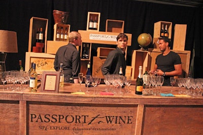 Wooden crates, vintage globes, and weathered leather trunks set the scene for the Passport to Wines bars, which had an ample supply of varietals from Italy, Germany, New Zealand, Argentina, and Spain.