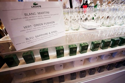Abigail Kirsch served a selection of drinks designed to match the colors of the fragrance bottles.