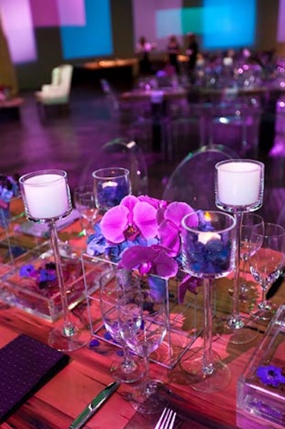 Winston Flowers provided arrangements in a mix of purples and blues, designed to complement the lighting.