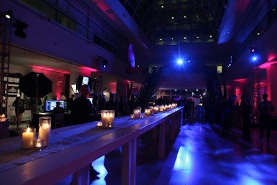 Candles flickered atop long tables at the after-party.