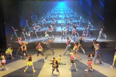 Dancers seemed to multiply in a video effect created onstage.