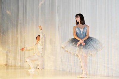 Ballerinas posed onstage during the live auction.