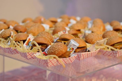 Entertaining Company handled catering, and menu items included beef sliders with Wisconsin cheddar, cornichon pickles, and french fries with cut-open ketchup packets.