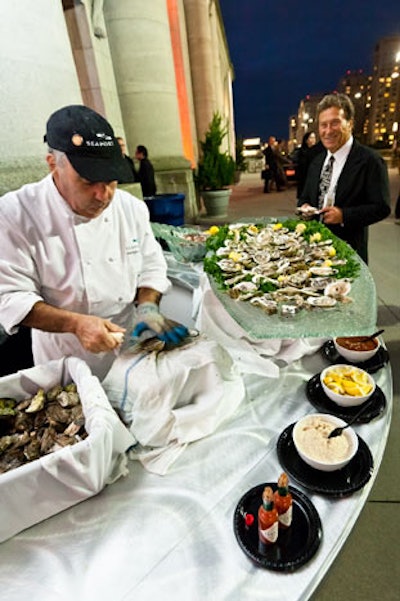 Food was a focus at this year's party. One chef station offered shucked oysters.