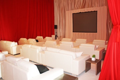 Journalists who did not have passes to be in the debate hall could watch the live stream in the YouTube Lounge, which was separated from the rest of the room by full-length red curtains and had four rows of white lounge furniture.