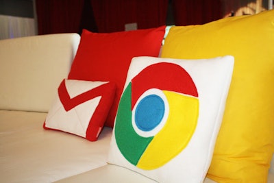 Google commissioned custom pillows from a craftsperson on Etsy, each decorated with the symbol of a Google product, such as Gmail or the Chrome browser.