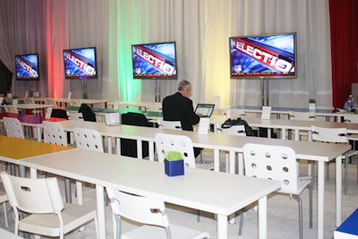 Organizers used tables and chairs from Ikea to create a work area in the back of the room with seating for 100.