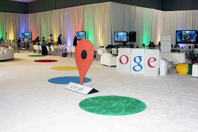 Colorful circles, each four feet in diameter, decorated the white carpet down the center of the room.