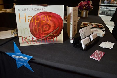 Chef Michel Richard had copies of his book on display at the Tasting Lounge while he served food samples from his restaurant Michel.