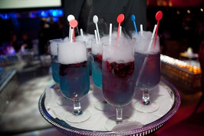 Guests were greeted with a blue raspberry lemonade cocktail. MistyStix�'dry-ice swizzle sticks�'created a fog effect.
