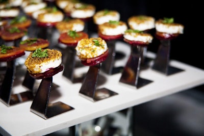 Toben Food by Design served roasted beets topped with goat cheese, pistachio, and arugula.