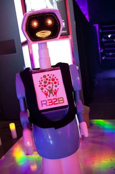 A robot greeted guests on the holographic carpet at the entrance.