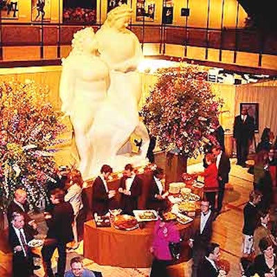 Event designer Carter Field placed 15-foot-tall arrangements of dogwood, lilac and peonies on both sides of Elie Nadelman's 'Circus Women' statues in the New York State Theater for HBO's premiere event for its documentary In Memoriam: New York City, 9/11/01.