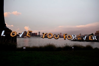 Designed to resemble a text message, Erin Hudak's 'Love You Forever' comprised gold and silver Mylar balloons placed on Dumbo's waterfront.
