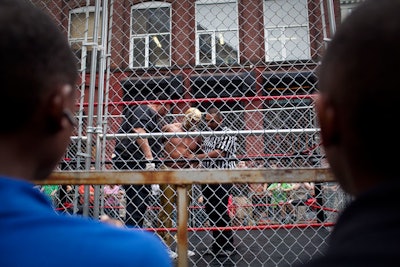 The installations and artwork on view at the festival weren't all digital: Shaun El C. Leonardo's 'Battle Royal' was a performance that put 15 blindfolded professional wrestlers in a 16-foot-tall steel cage on the Pearl Street Triangle.