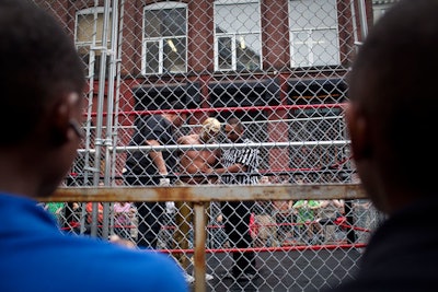 The installations and artwork on view at the festival weren't all digital: Shaun El C. Leonardo's 'Battle Royal' was a performance that put 15 blindfolded professional wrestlers in a 16-foot-tall steel cage on the Pearl Street Triangle.