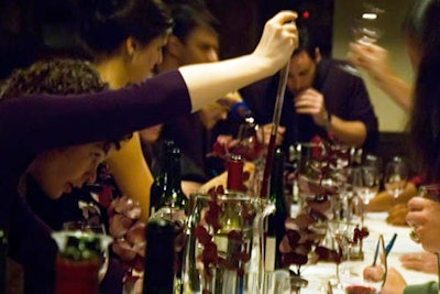 Participants measure wine during a blending session at the Brooklyn Winery.