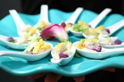 During the main reception, waiters passed spoons of creamy blue crab and asparagus with a lemon oil drizzle and tricolor cauliflower florets.