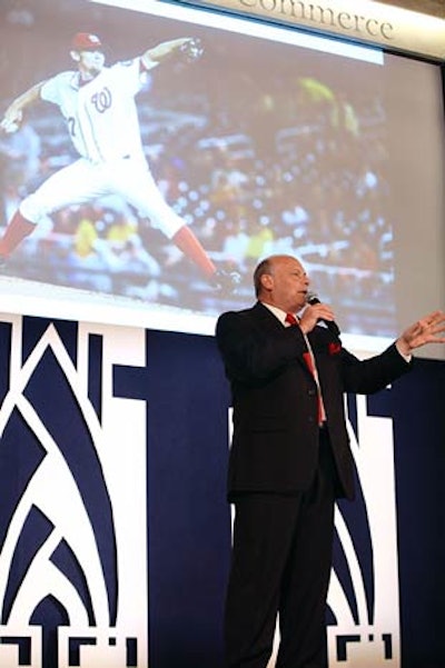 Auctioneer Howard Parzow led the night's live auction of eight items, which drew in $18,800.