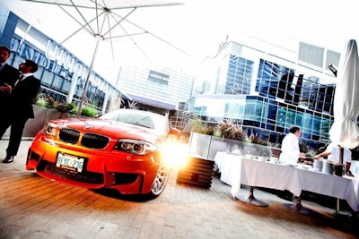 The BMW M1 Coupe was parked on the patio outside.