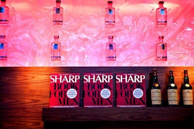 Sharp: The Book For Men and bottles of Absolute Elyx decorated the space behind the bar.