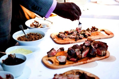 Guests helped themselves to grilled bone-in rib steak and lamb and could add sauces like truffle dijonnaise, balsamic marinated mushrooms, black garlic mustard, and fennel seed mustard.